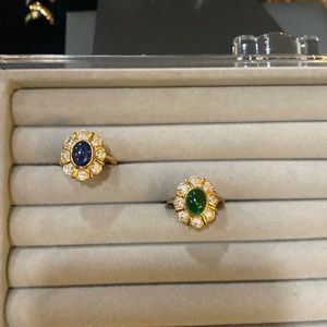 Oval Emerald and Diamonds / Blue Sapphire and Diamonds